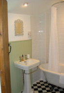 There is a newly refurbished bathroom with shower and W.C and a further W.C on the ground floor.