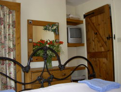 There are three airy and comfortable bedrooms all with TV/DVD or Video and all provided with fresh towels and linen. 
