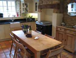 This charming period cottage has flagstone floors, a beautiful open wood fire and a fully fitted modern kitchen dining room; with dishwasher, washing machine, microwave and not forgetting the Rayburn Royal Range Stove