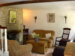 This charming period cottage has flagstone floors, a beautiful open wood fire and a fully fitted modern kitchen dining room; with dishwasher, washing machine, microwave and not forgetting the Rayburn Royal Range Stove