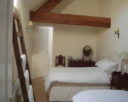 The first floor comprises a galleried landing with three en suite bedrooms.
