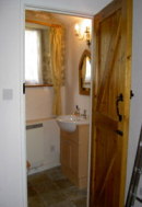 There is a newly refurbished bathroom with shower and W.C and a further W.C on the ground floor.